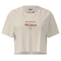 Latina-inspired baby tee with Todo Se Puede Con Mi Cafecito graphic in espresso brown lettering.