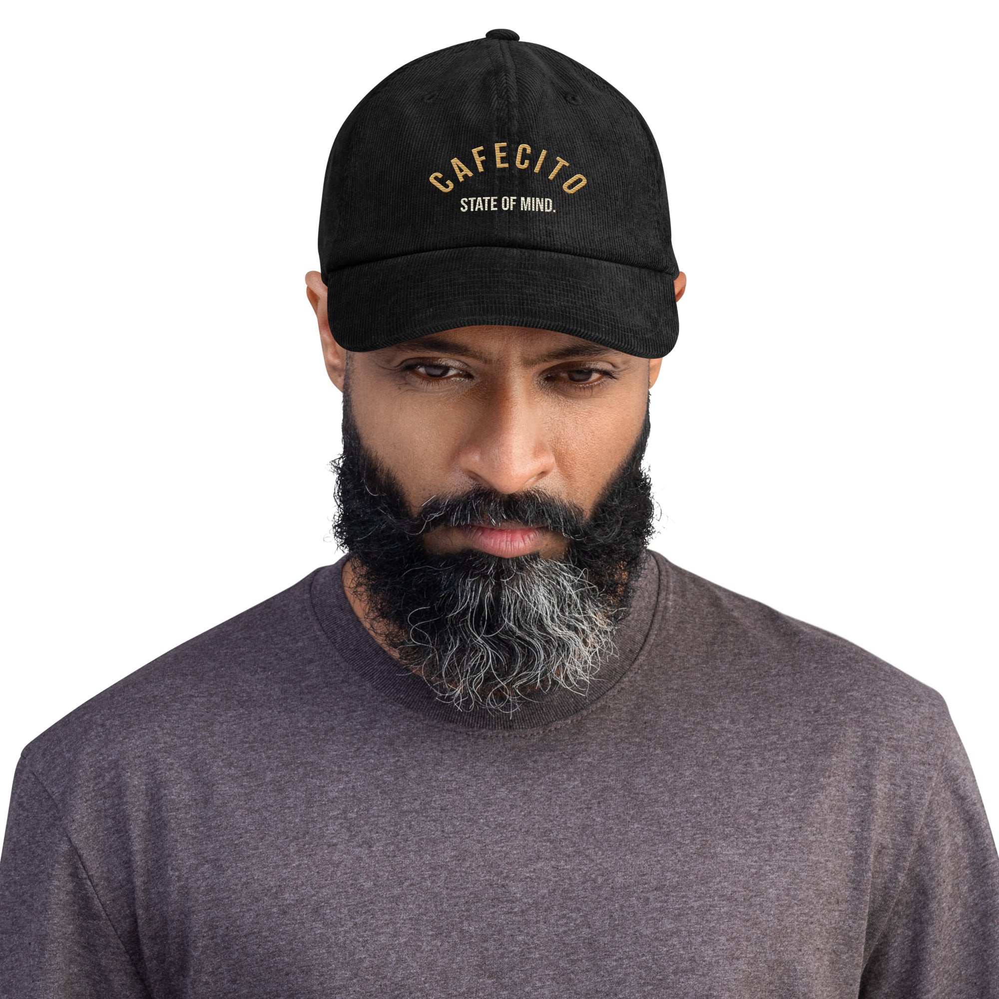 man wearing a coffee hat cafecito state of mind